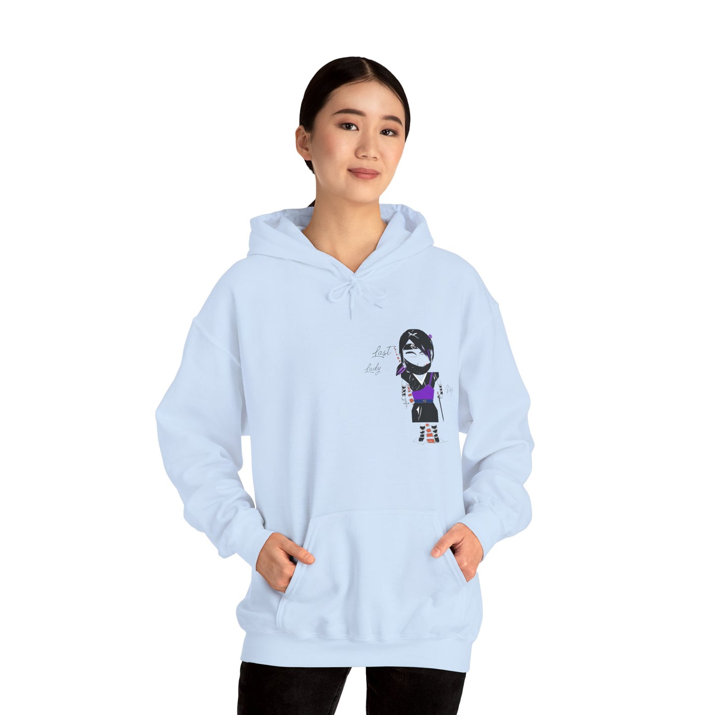 Front view of a lady model wearing a light blue hoodie with a lady ninja graphic design on a white background