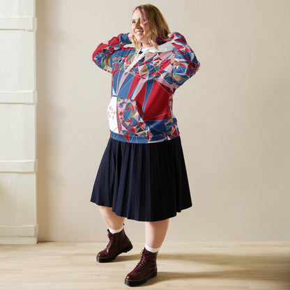 Person wearing a colorful geometric-patterned sweater and dark skirt indoors.