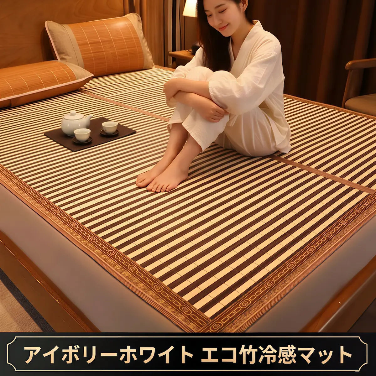 Woman sitting on a striped mattress in a room with a lamp and pillows.