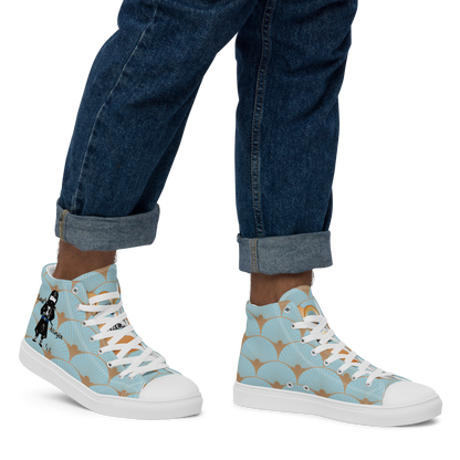 High-top sneakers with a playful ninja graphic design and a fish scale pattern worn with rolled-up jeans on a white background