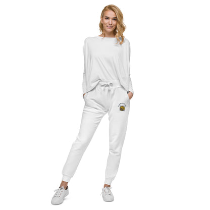 Woman wearing a white tracksuit with a 'Fun Wear Code' logo on the pants against a white background