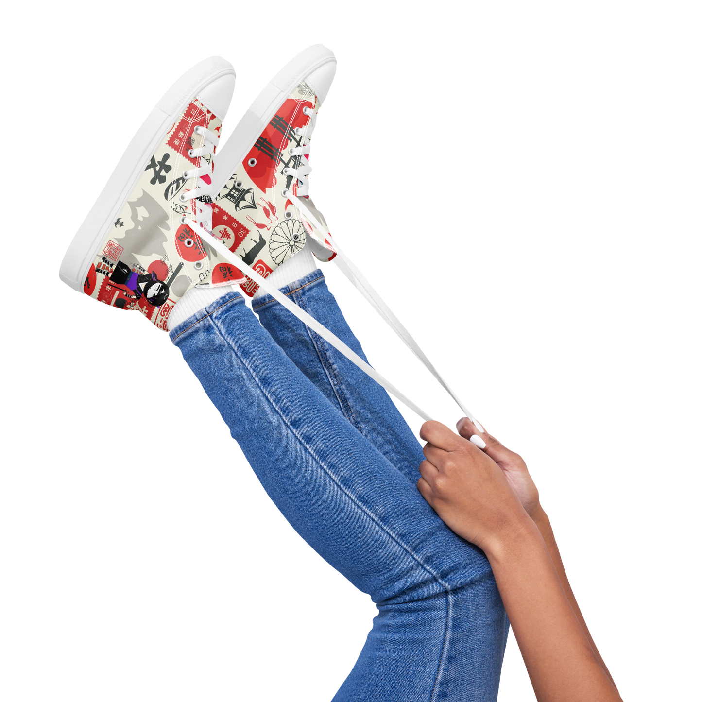 Colorful high-top sneakers with a lady ninja and the other Japanese iconic graphic design worn by a person in blue jeans on a white background